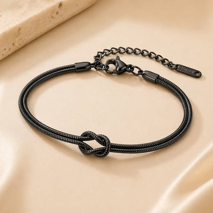 Pulseira Snake Duo Love preta minimalista em aço inoxidável com nó central elegante feminina ajustável