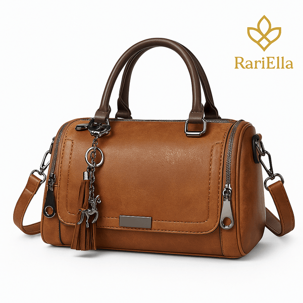 Bolsa Boston Camel Heritage RariElla em fundo branco, modelo vintage premium de grande capacidade com alça removível e detalhes em metal