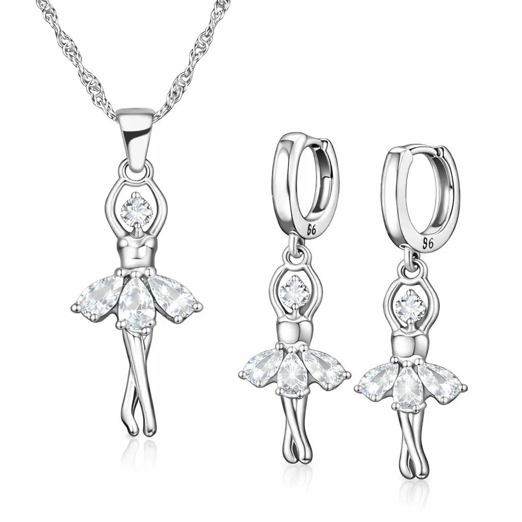 Conjunto Ballet Lumière em Prata 925 com pingente de bailarina e brincos delicados com zircônia cúbica, joia feminina elegante em fundo branco.