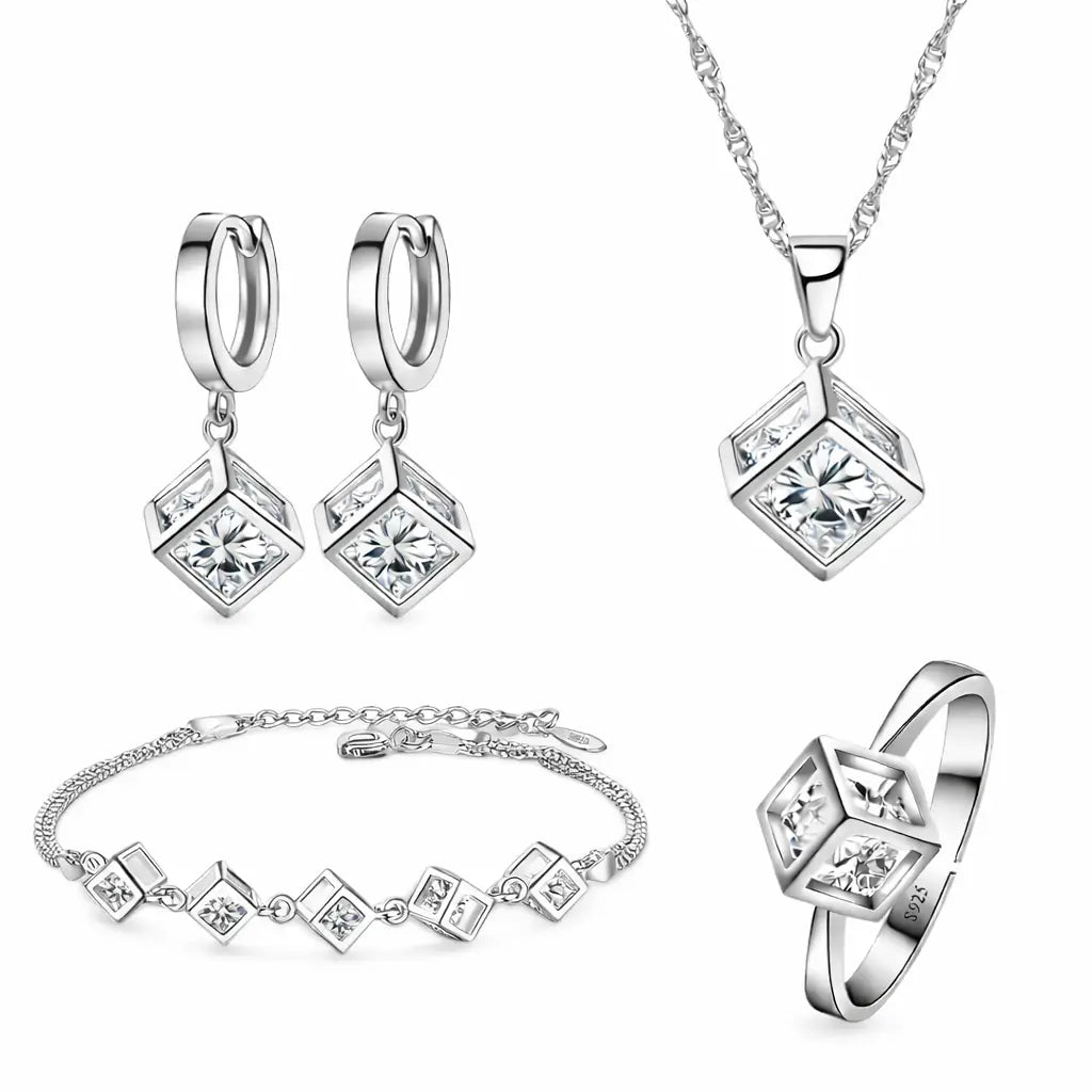 Conjunto Lumière Square feminino em prata 925 com zircônia cúbica, colar, brincos, pulseira e anel de design geométrico elegante.